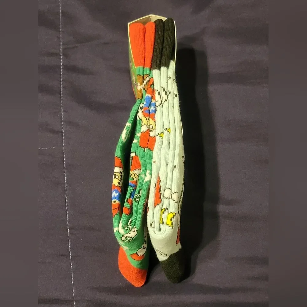 Green Christmas Socks with Santa and Football Design